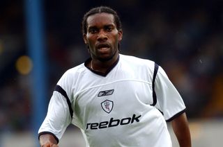 Jay-Jay Okocha in action for Bolton Wanderers in a pre-season friendly against Cardiff City in August 2002.