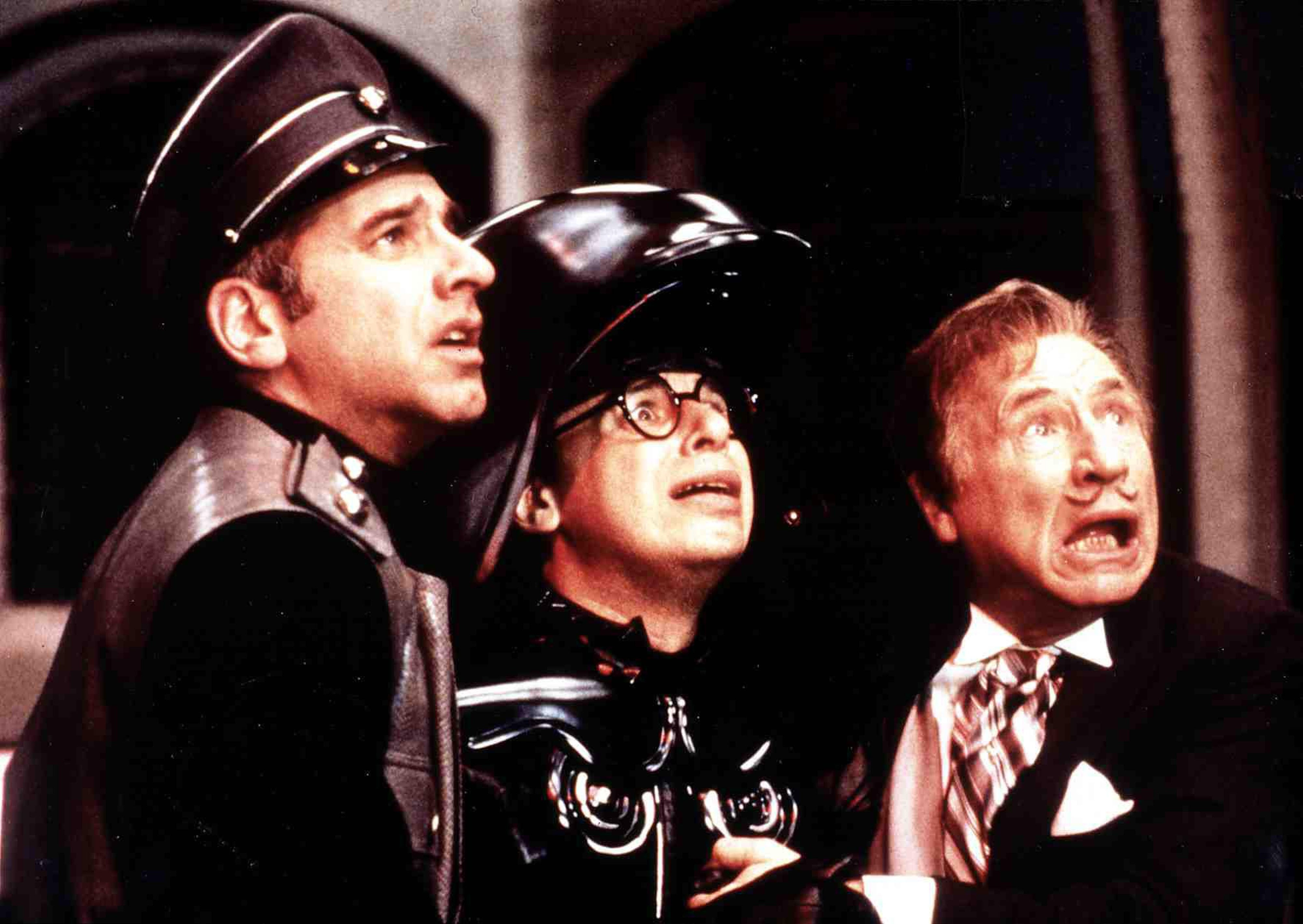 George Wyner (As Colonel Sandurz), Rick Moranis (as Dark Helmet) and Mel Brooks as President Skroob) looking up in fear in Spaceballs
