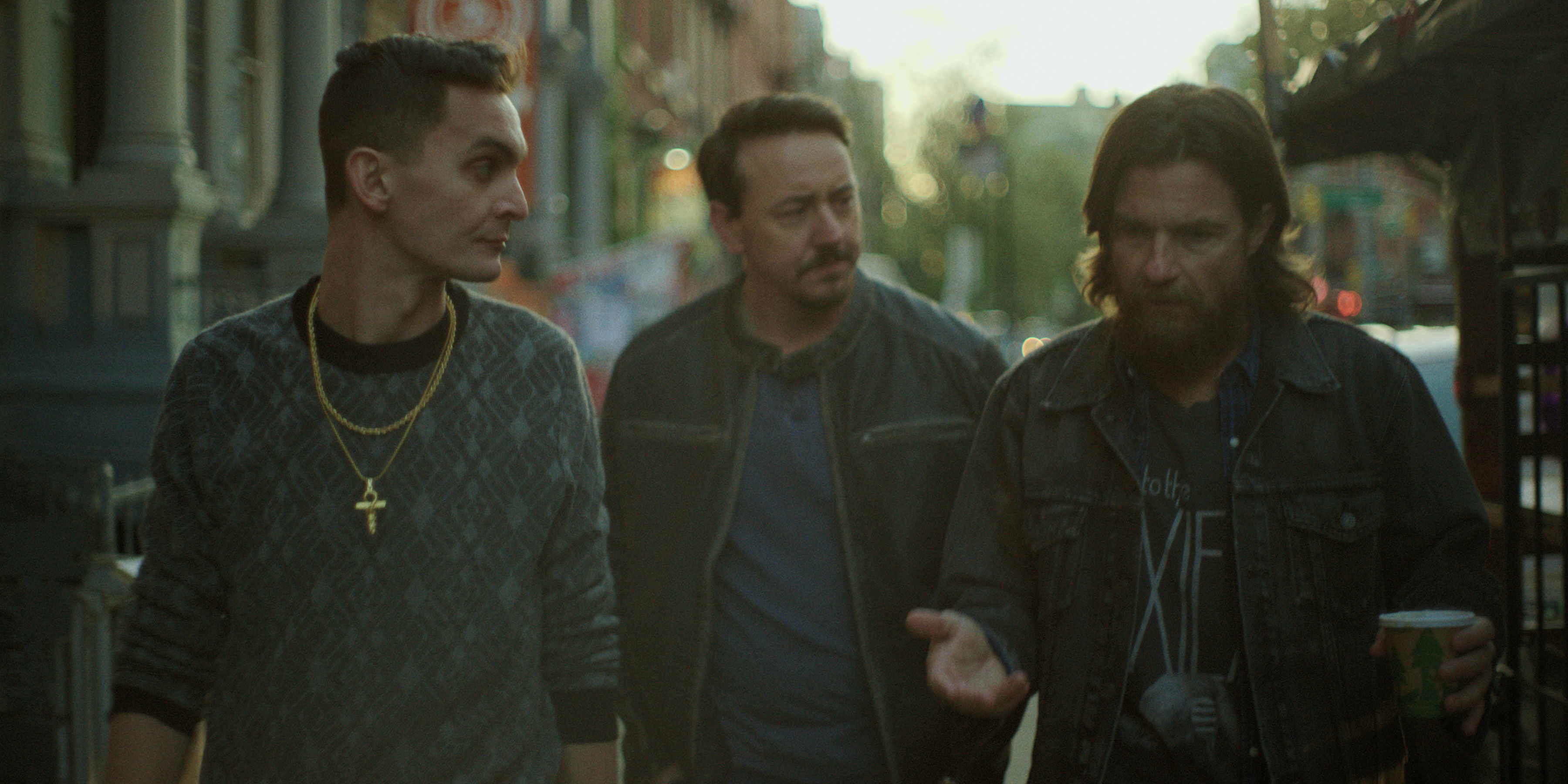 Forrest Weber as Junior, Chris Coy as Babbit, Jason Bateman as Vince walking through the streets of new york in black rabbit