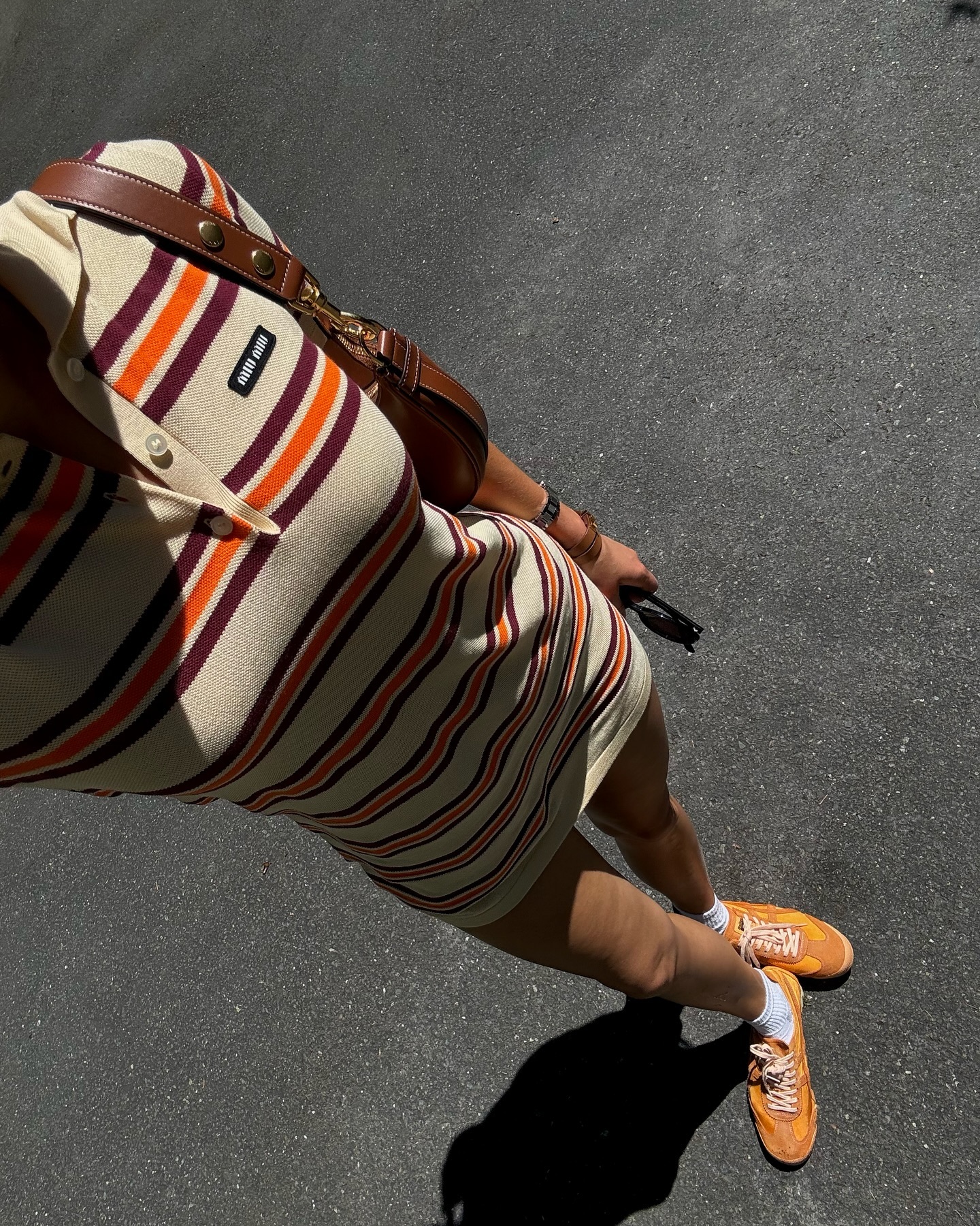 An image of @styledsara wearing Dries Van Noten trainers, one of the best summer trainers.