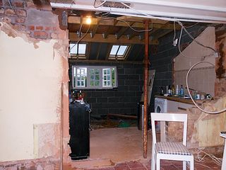 house renovation in progress knocking down walls