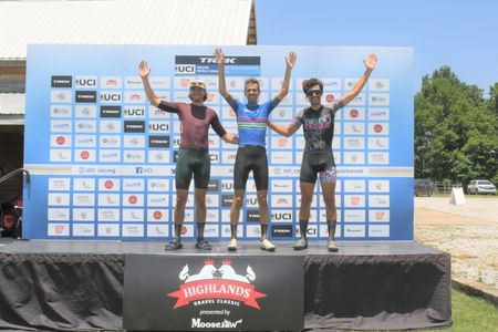 Andrew Evans (pictures middle) of Rogers, Arkansas won the Mens UCI Gravel World Series' Highlands Gravel Classic in Fayetteville, Arkansas. Evans finished in 4:05:30 and 16.2 mph average speed to beat runner-up Mason McNeill (pictured left) by 3:53 and third-placed Rane Roatta (pictured right) by 6:40.