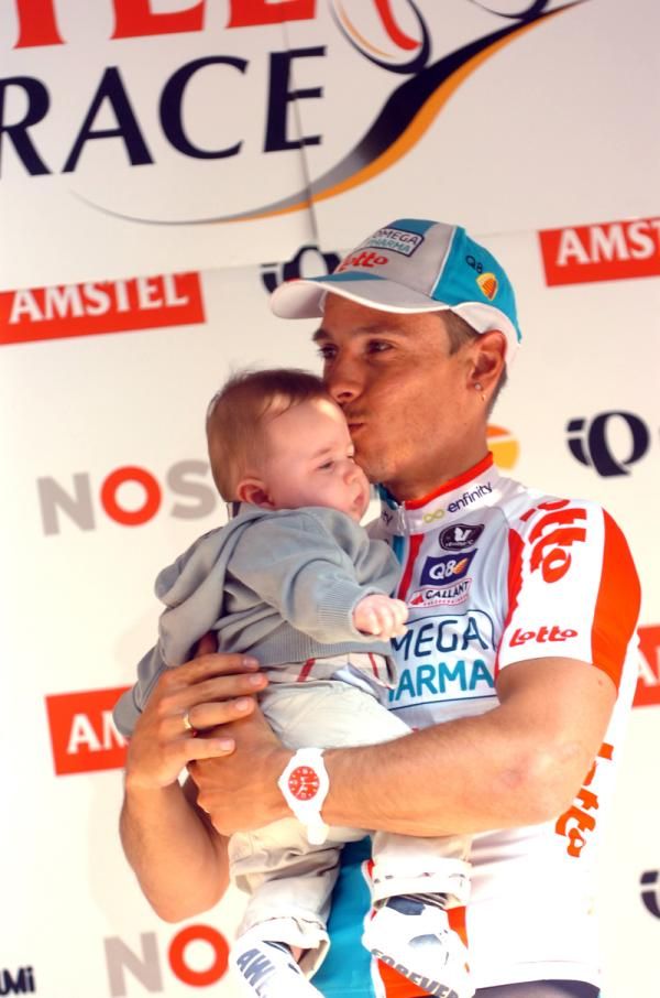 Gilbert on the winner's podium with his son