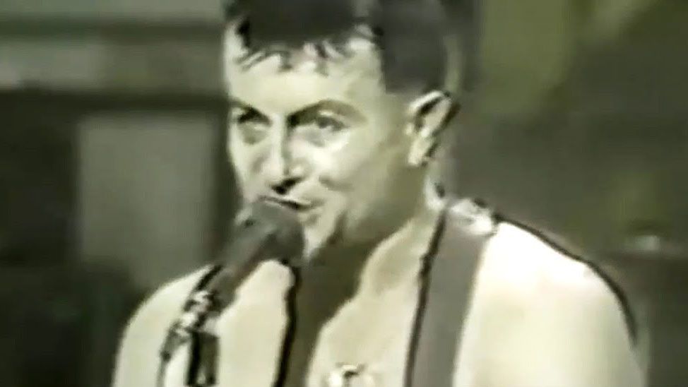 A screenshot of Lee Ving on SNL