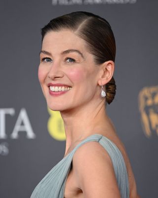 Rosamund Pike at the BAFTAs 2024 with an updo