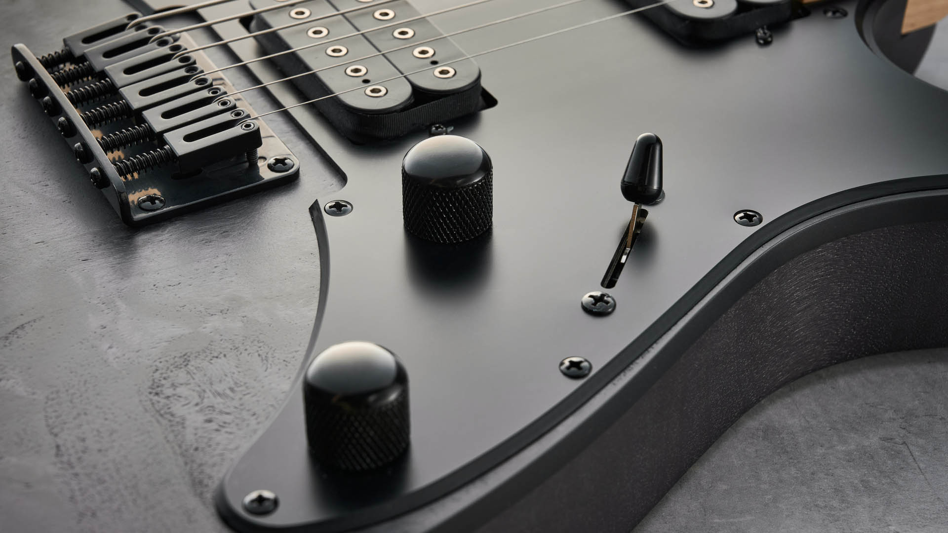 The Ibanez Standard Series RGR431PB finished in Charcoal Gray Flat
