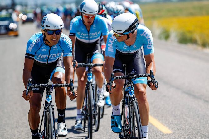 Elevate-KHS riders talk on the front while riding tempo to keep the break in check during stage 1 of the 2019 Tour of Utah