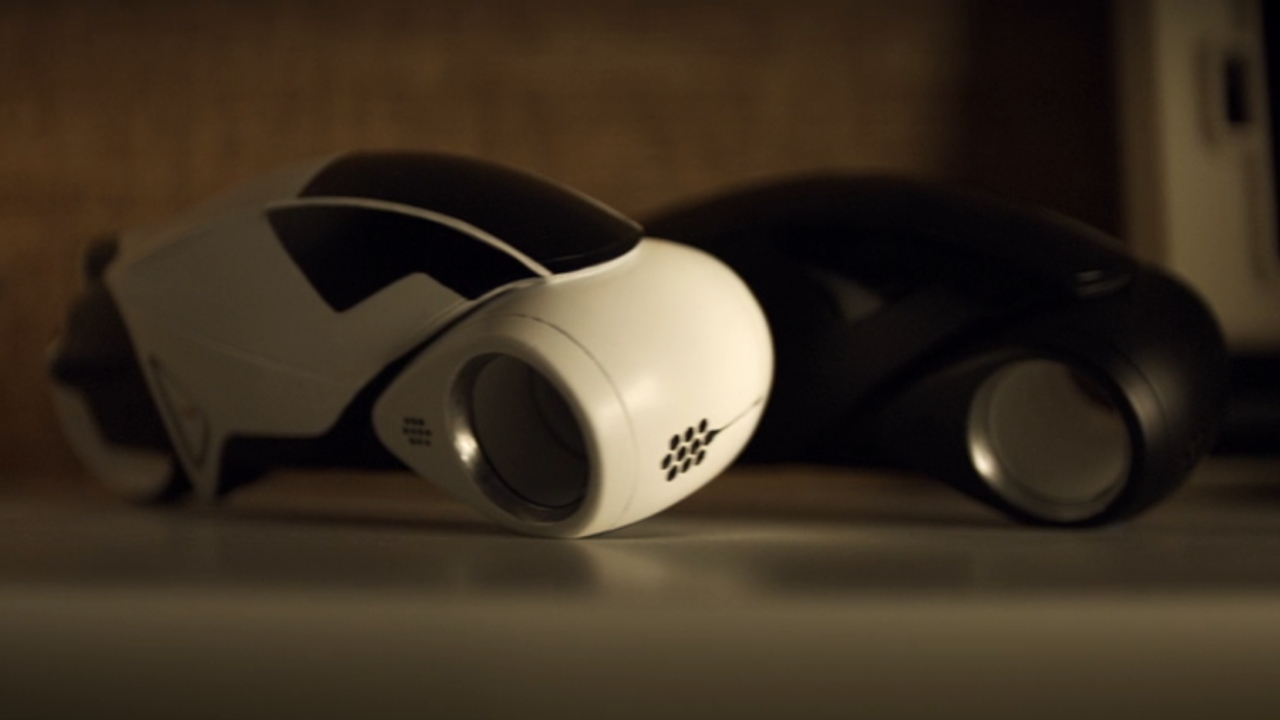lightcycle toys on a shelf in Tron: Legacy