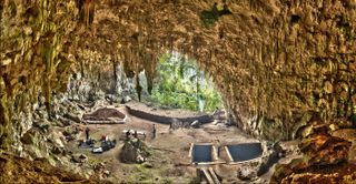 A team of researchers prepares for more recent archaeological excavations in the limestone cave called Liang Bua, on the Indonesian island of Flores. 
