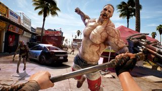 En topless muskulös manlig zombie attackerar spelaren.