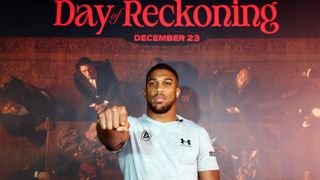  Anthony Joshua poses for a photo as he arrives ahead of the Day of Reckoning Fight Night – Joshua vs Wallin – on December 23, 2023 in Riyadh, Saudi Arabia