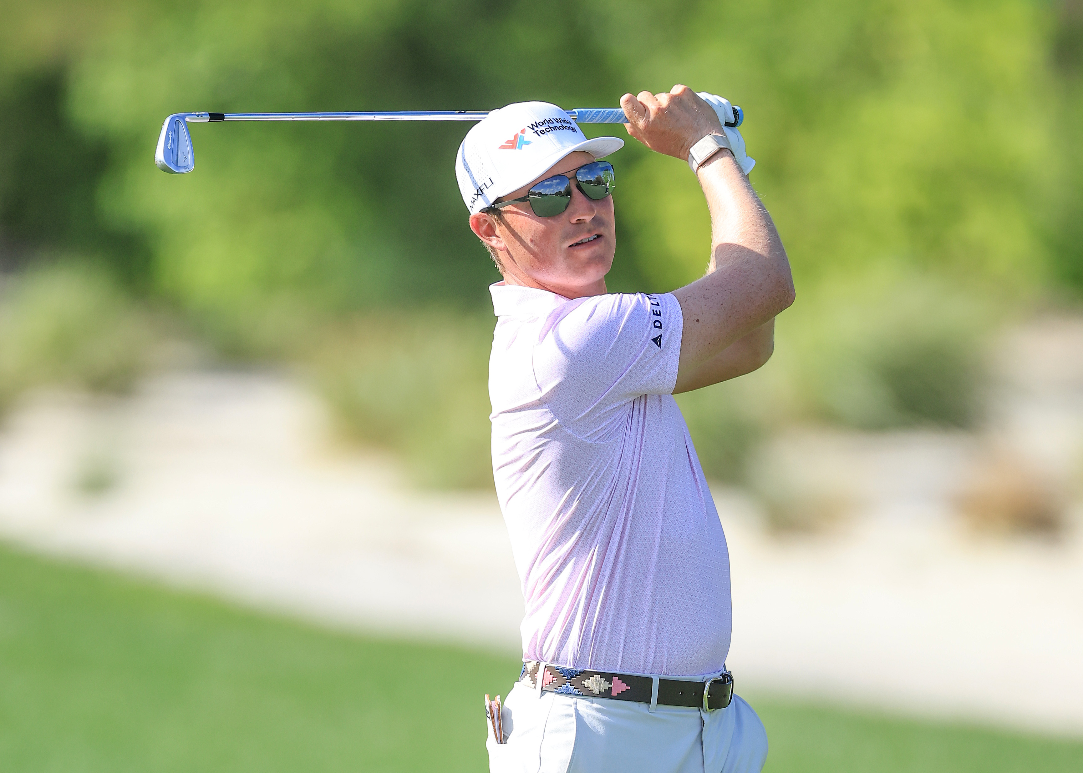 Ben Griffin hits an iron shot