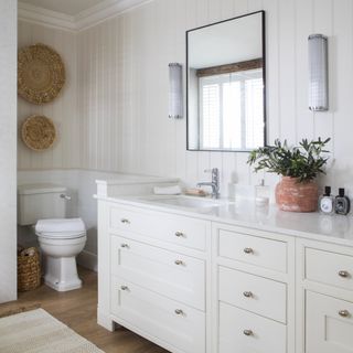 white bathroom with large vanity