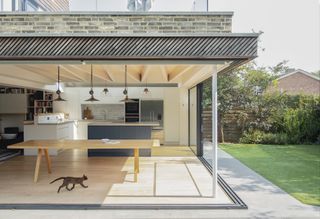 modern extension with diagonal timber cladding and kitchen