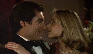 The Living Daylights Timothy Dalton and Maryam D'Abo embrace in her dressing room