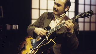 Joe Pass of the Oscar Peterson Trio performs on a BBC television show filmed at BBC Television Centre in London, England in March 1977.