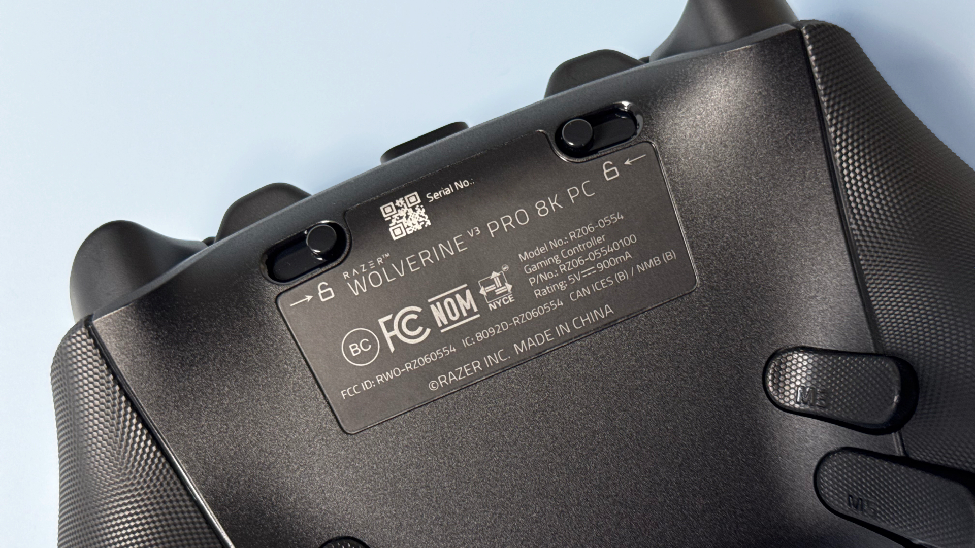 Razer Wolverine V3 Pro 8K Pro controller on a light blue background