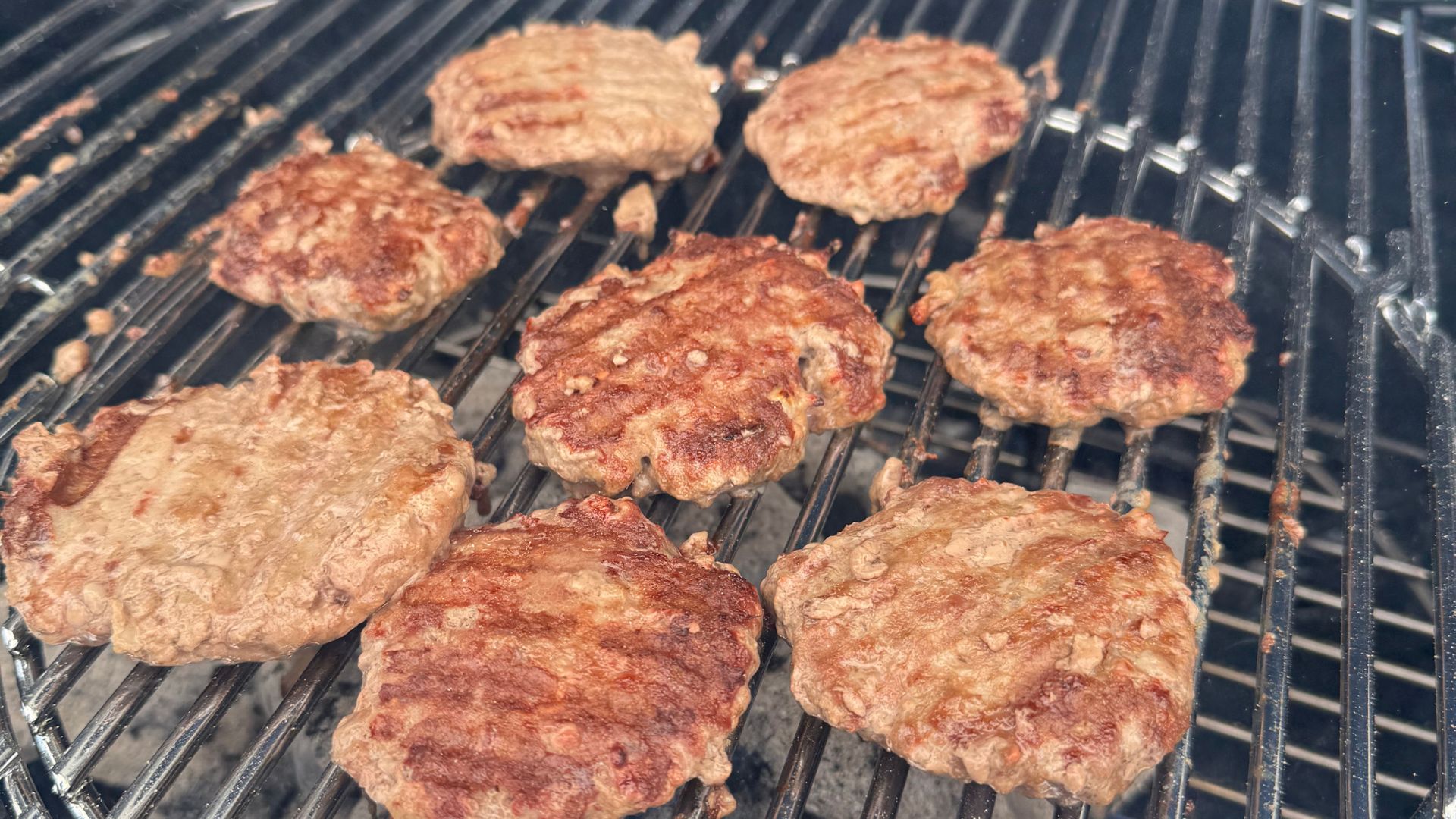 Home-made burgers cooked on the Weber Master-Touch GBS C-5750 Charcoal Barbecue