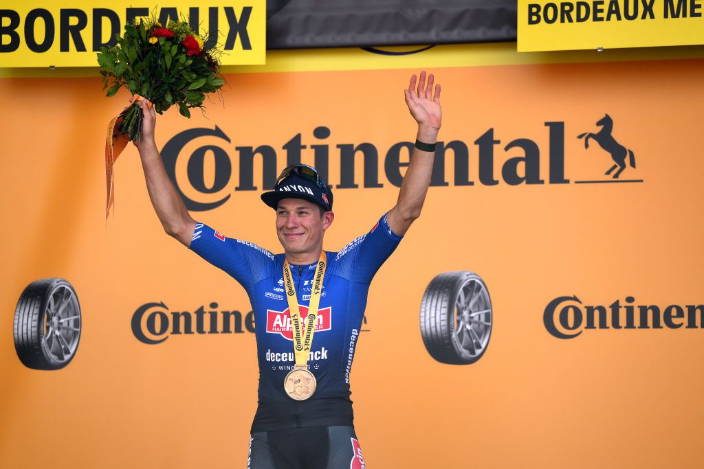 BORDEAUX FRANCE JULY 07 Jasper Philipsen of Belgium and Team AlpecinDeceuninck celebrates at podium as stage winner during the stage seven of the 110th Tour de France 2023 a 1699km stage from Mont de Marsan to Bordeaux UCIWT on July 07 2023 in Bordeaux France Photo by David RamosGetty Images