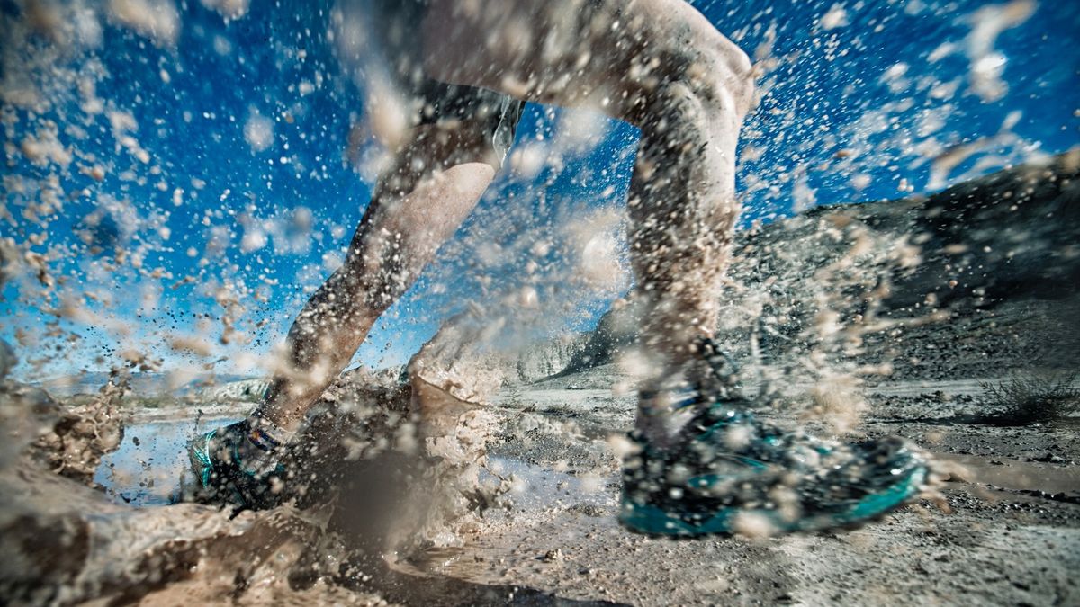 trail runner in wet