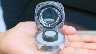 The Noise Luna Ring 2 shown up close in the palm of a hand inside its charging case at CES 2025