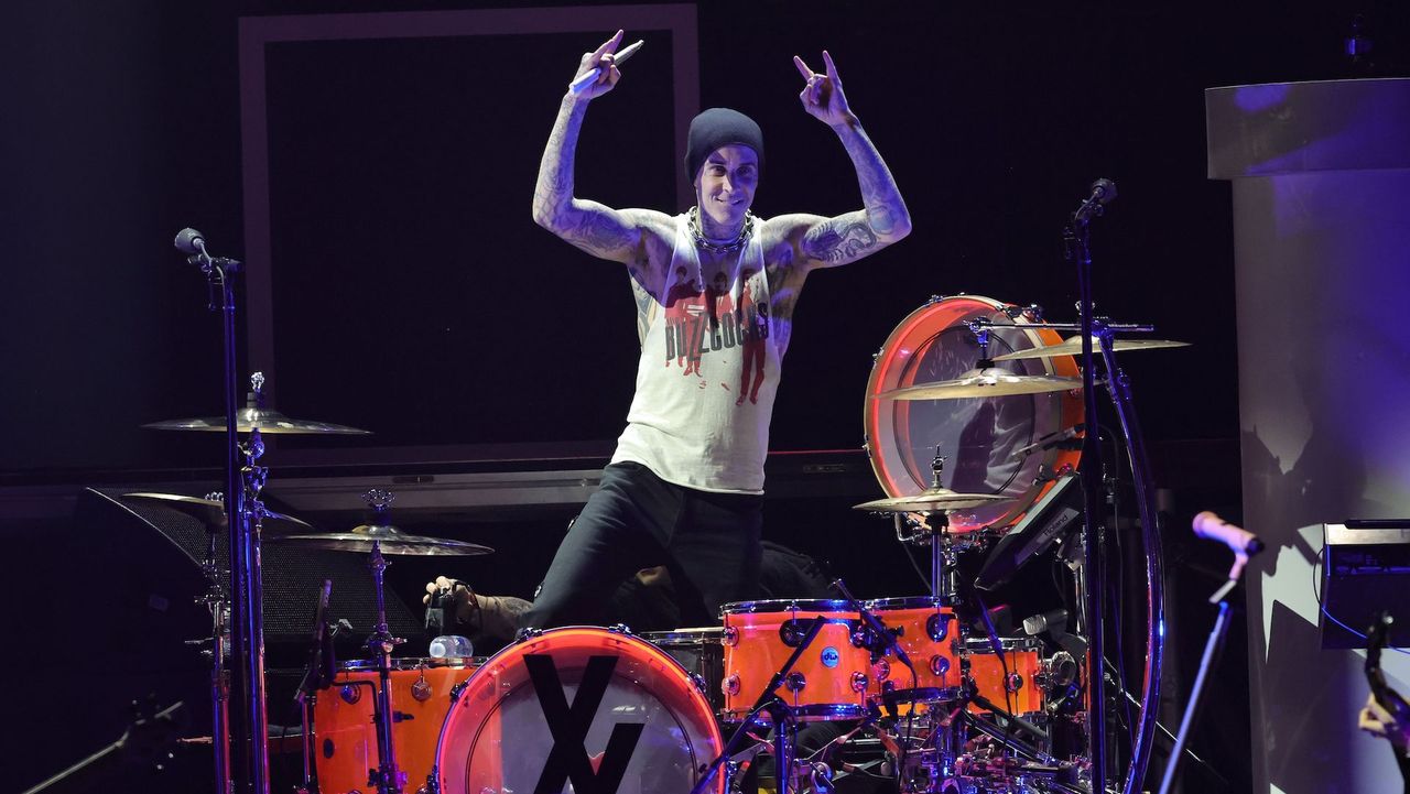  Travis Barker performs onstage during the Bud Light Super Bowl Music Festival at Crypto.com Arena on February 10, 2022 in Los Angeles, California.