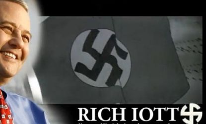 The Atlantic recently uncovered photos of Rich Iott wearing a Nazi uniform. Iott reassures it was purely for historical reenactment purposes. 