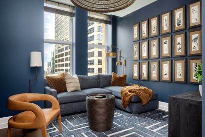 Navy blue living room with rust accents