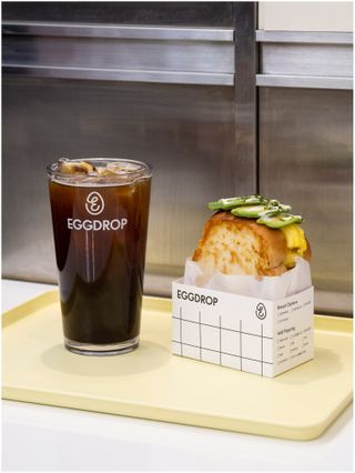 Eggdrop-branded cola and sandwich