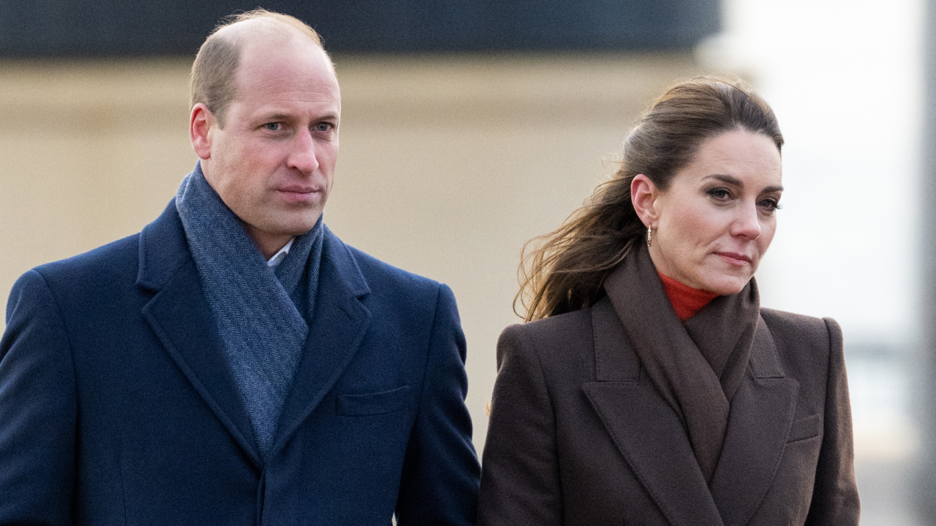 Prince William wears a navy coat and Kate Middleton wears a brown coat during 2022 Boston visit