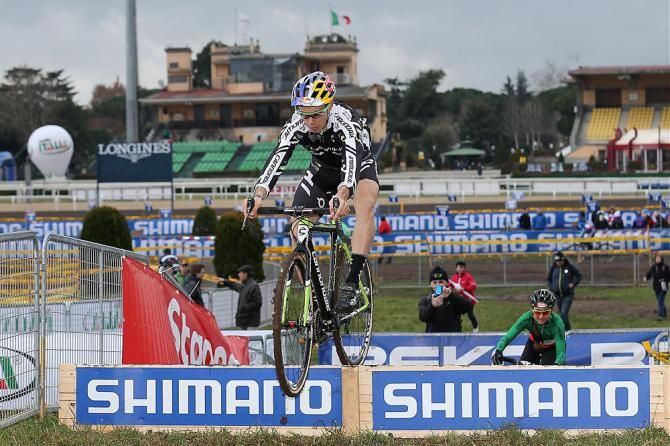 Marco Fontana flies over a barrier