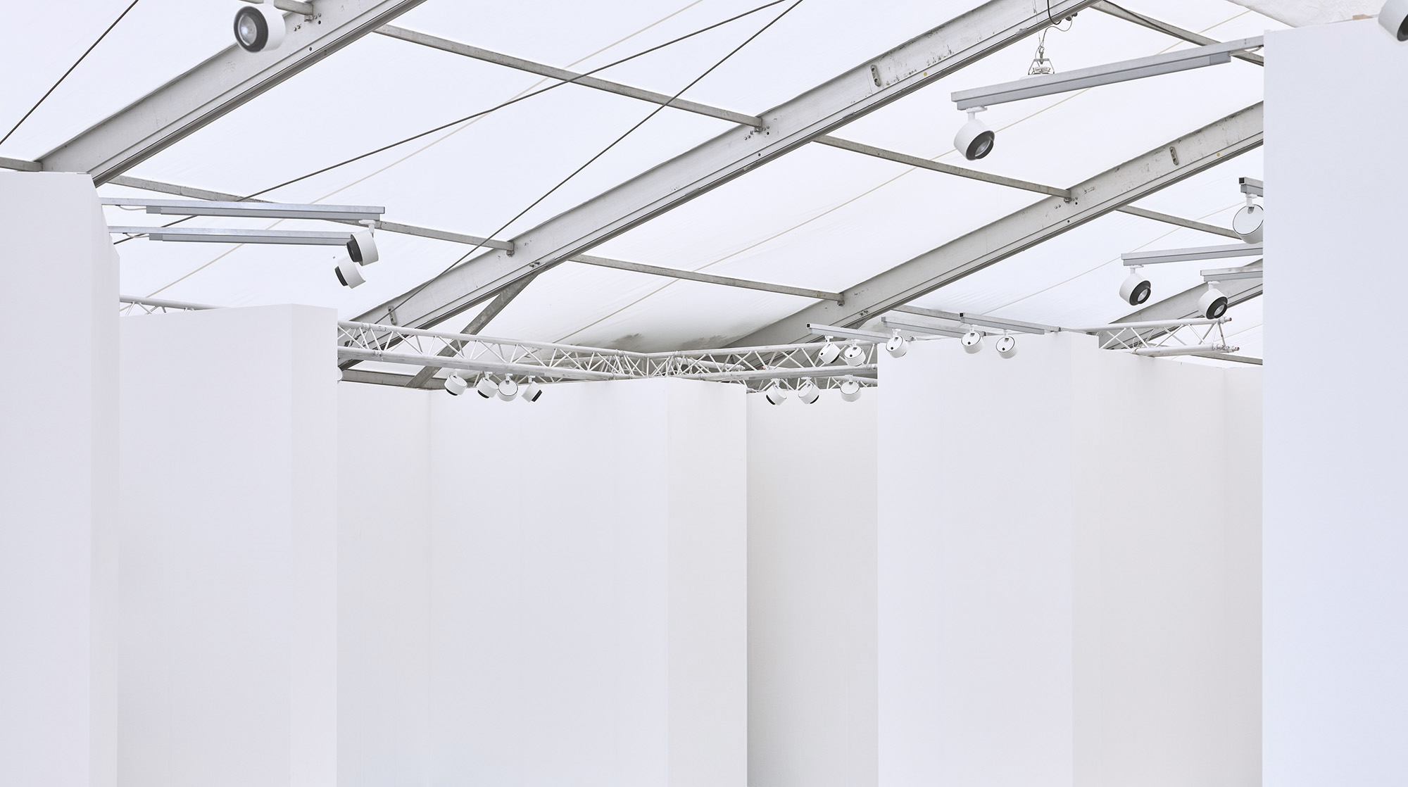 Frieze entrance pavilions London 2025 interior looking up to the white ceiling