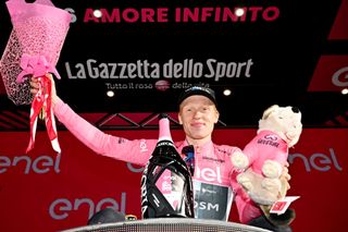 GRAN SASSO DITALIA CAMPO IMPERATORE ITALY MAY 12 Andreas Leknessund of Norway and Team DSM Pink Leader Jersey celebrates at podium during the 106th Giro dItalia 2023 Stage 7 a 218km stage from Capua to Gran Sasso dItalia Campo Imperatore 2123m UCIWT on May 12 2023 in Gran Sasso dItalia Campo Imperatore Italy Photo by Stuart FranklinGetty Images