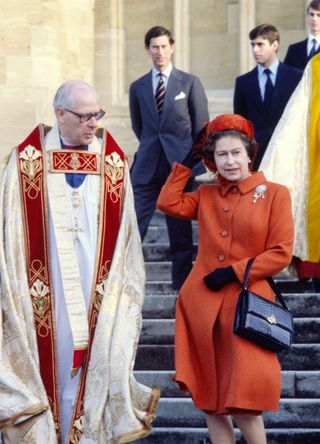 The late Queen leaving church with a minister