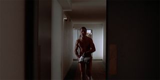 American Psycho Christian Bale as Patrick Bateman naked with chainsaw