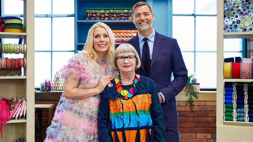 From left to right: host Sara Pascoe, and fashion designers and show judges Esme Young and Patrick Grant, in colorful attire and photographed against a well-stocked haberdashery.