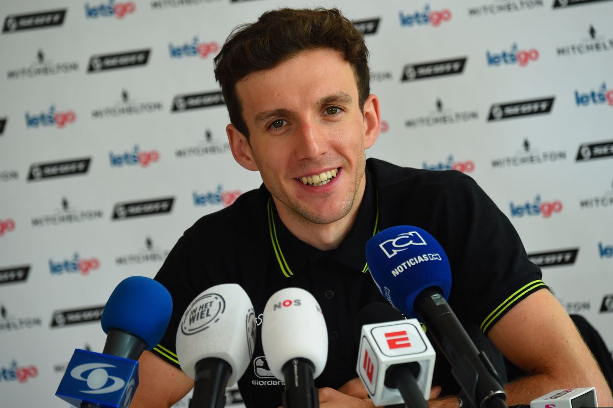 Simon Yates faces questions from the press