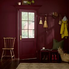 Divine Damson red on walls and door of a bootroom