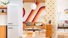 Three pictures of retro home decor - a kitchen with a white Smeg fridge, a living room with a wavy red and orange mural and orange couch, and an entryway with orange and blue star wallpaper