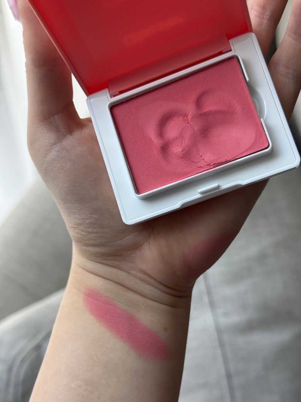 Denise Primbet testing the new Glossier Cloud Paint Plush Blush