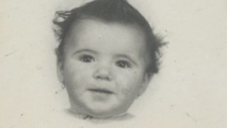 A black and white photo of Irene Meca Mateo as a baby in Long Lost Family.