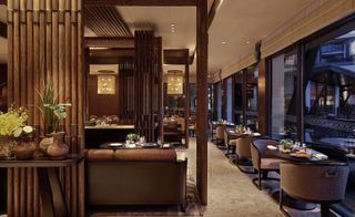 The interiors are furnished with Fu’s trademark fondness for textures and burnished trims, in particular bronzed bamboo screens, smoked oak, beige marble, rattan panels, and pendant lamps made of woven straw