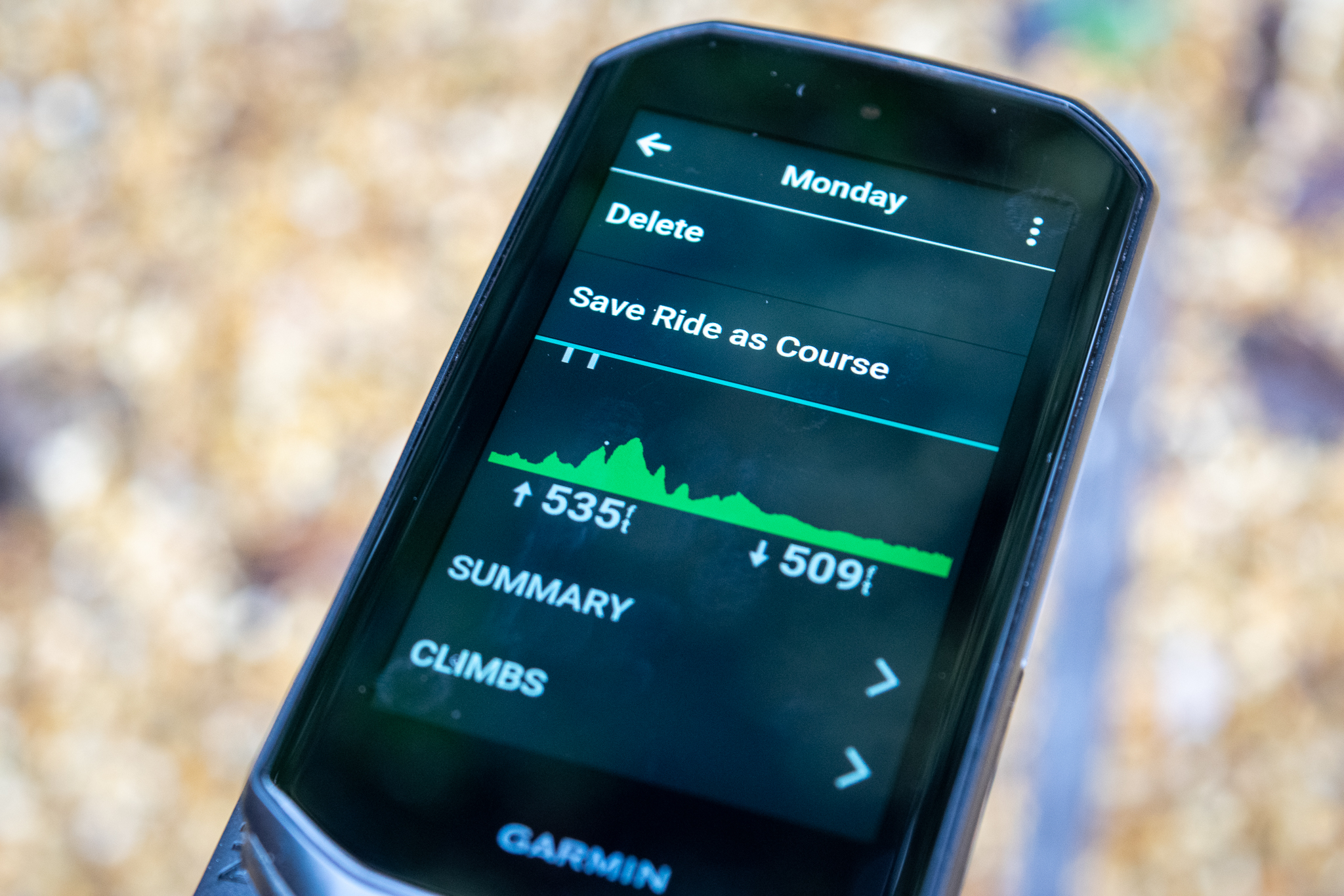 An image of Garmin Edge 1050 on a handlebar mount 