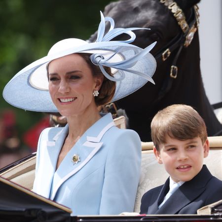 Princess Kate wears a baby blue Catherine Walker coat dress and matches it to Prince George and Prince Louis's ties at Trooping the Colour 2026