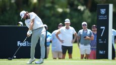 Cameron Young plays a tee shot on the seventh hole during the first round of Cadillac Championship at Trump National Doral