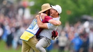 Nick Taylor celebrates winning the RBC Canadian Open with his caddie