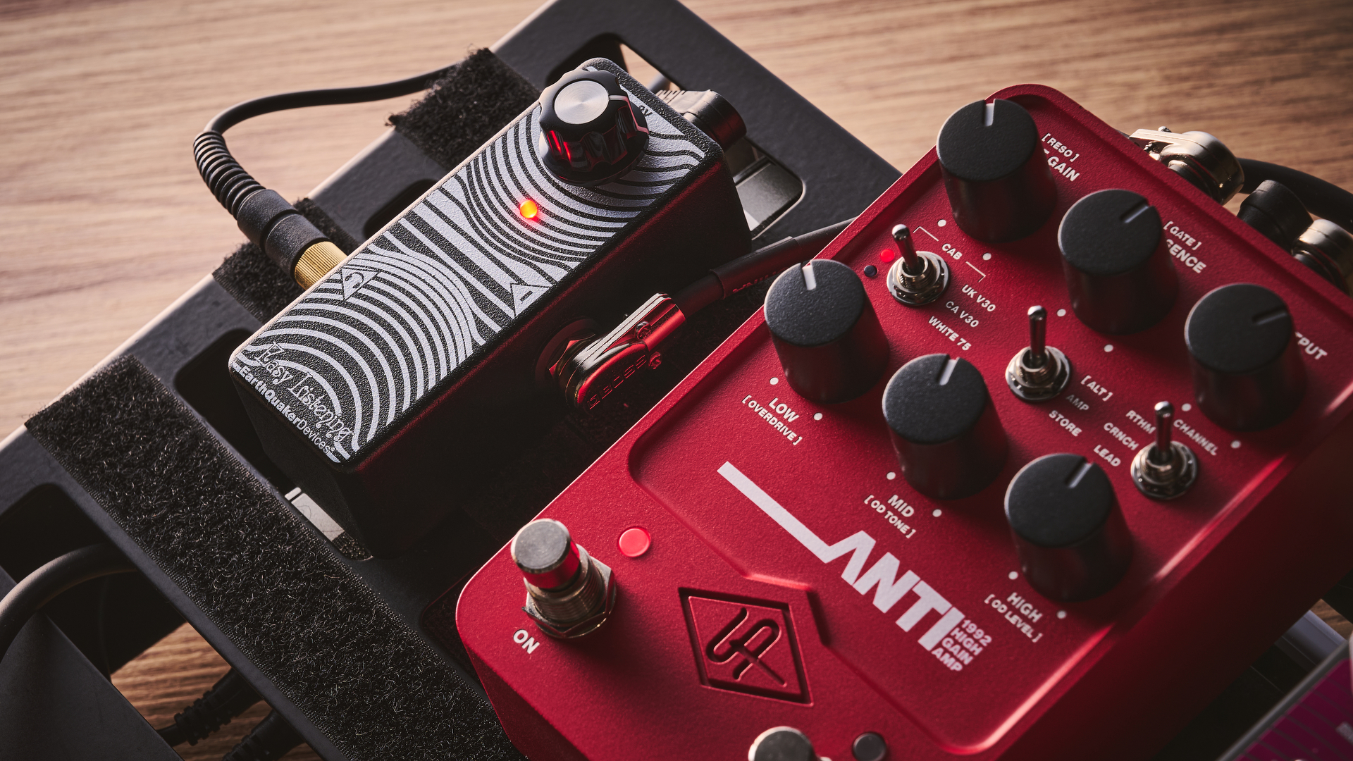 An Earthquaker Devices Easy Listening guitar headphone amp on a pedalboard