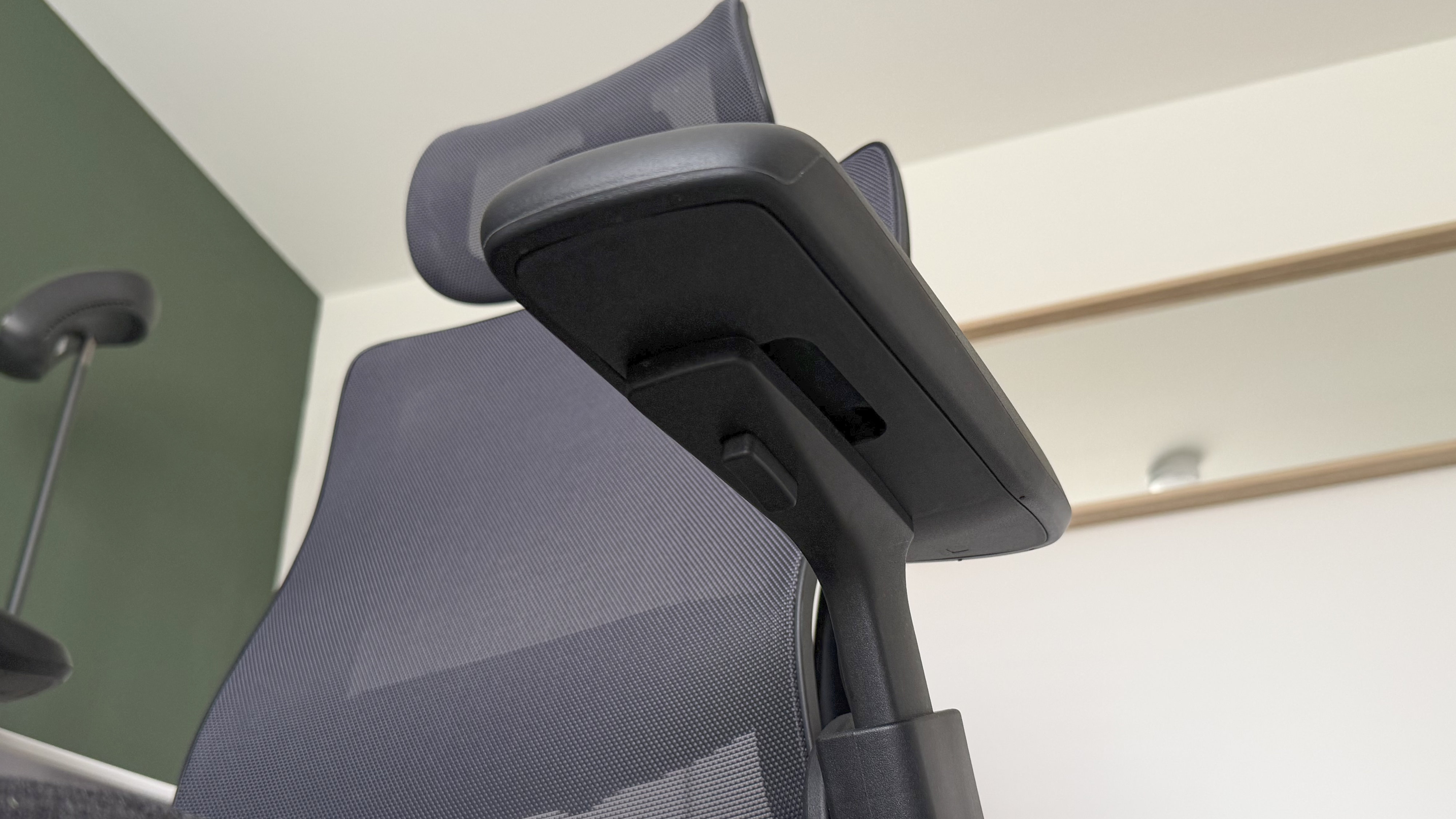 The underside of the armrest on the Elgato Embrace