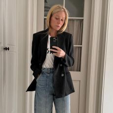 Gwyneth Paltrow styled culotte jeans with a black blazer.
