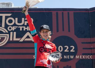 Lauren De Cresenzo (Cinch Rise) shows off the locally crafted pottery bowls that serve as winners trophies for the Tour of the Gila.